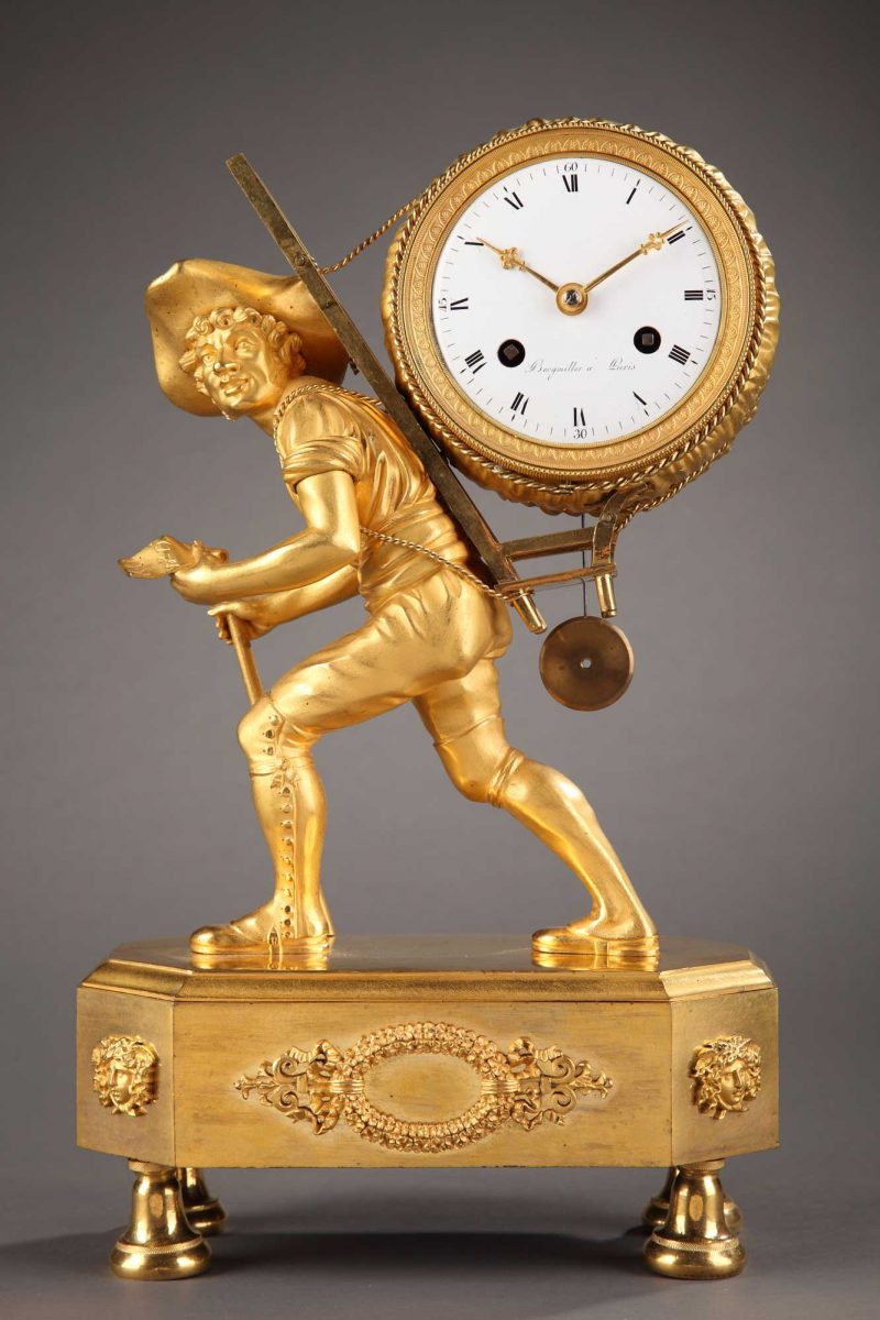 Pendule en bronze doré et ciselé. Epoque Empire Signée Bergmiller à Paris, sur un projet de Reiche et un bronze de Galle.